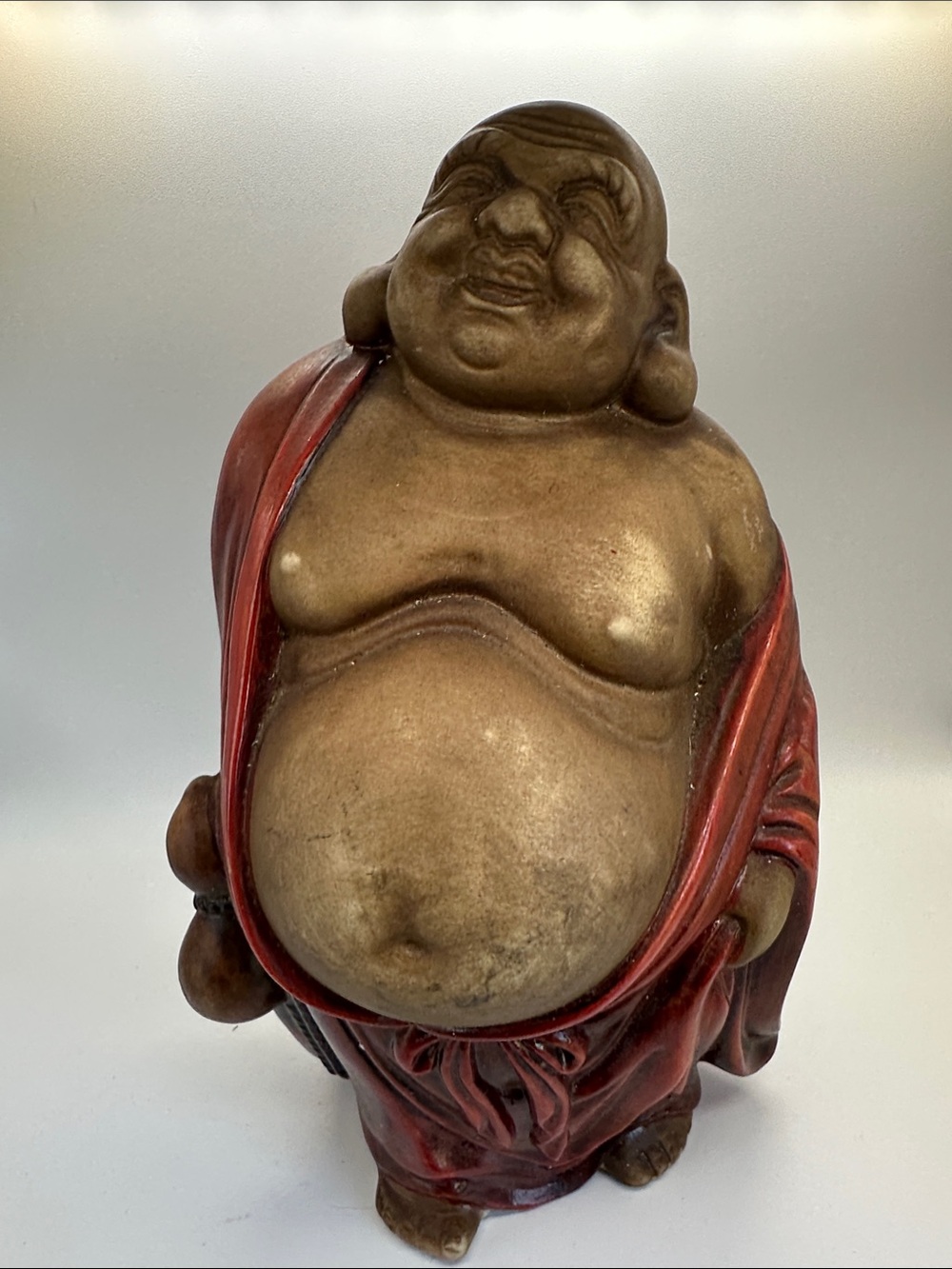 Smiling Buddha Statue in Red and Brown - Decorative Home Art
